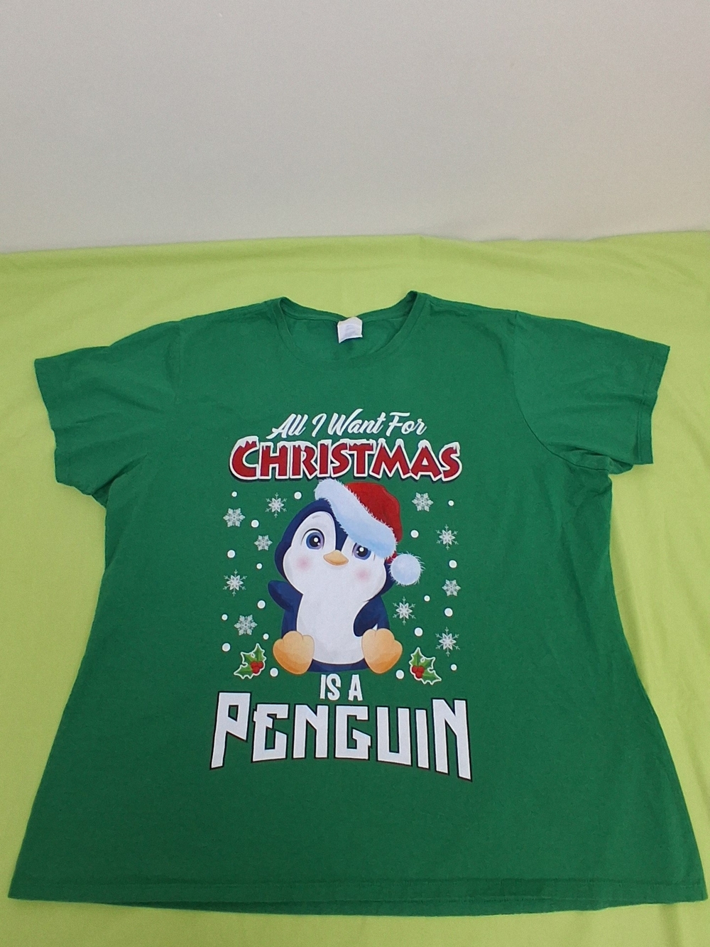 All I Want For Christmas Is A Penguin Green Holiday T‑Shirt